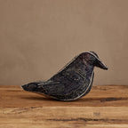 Coral & Tusk Blackbird of Mystery three-dimensional decorative embroidered felt bird with detailed feather stitching on all sides.
