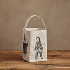 Coral & Tusk Halloween Costumes Bucket, Halloween canvas trick-or-treat bag with embroidered animals in costume on each side, featuring a bunny in a skeleton costume and a cat in a witch costume.
