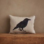 Coral & Tusk 12 × 16 inch Blackbird with Acorn embroidered linen pillow.
