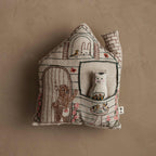 Introducing the Coral & Tusk x Nekomura san Pocket House by Coral & Tusk—this decorative pillow is shaped like a house and adorned with whimsical, hand-stitched embroidered animals: a bear waving by the door, a cat with a bowl in the window, a bunny, and two birds perched on the roof. Set against a plain beige background, its charming linen details are reminiscent of an embroidered doll.