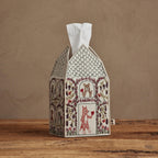 Coral & Tusk Home Is Where the Heart Is Tissue Box Cover embroidered on all sides to resemble a house with floral vines, different animals holding hearts in each window, and a fox at the door.